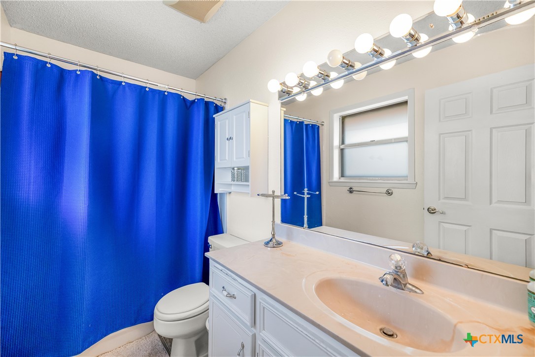 307 Pheasant Drive Victoria, TX 77905 - Photo 16 of 33 a bathroom with a sink a toilet and shower
