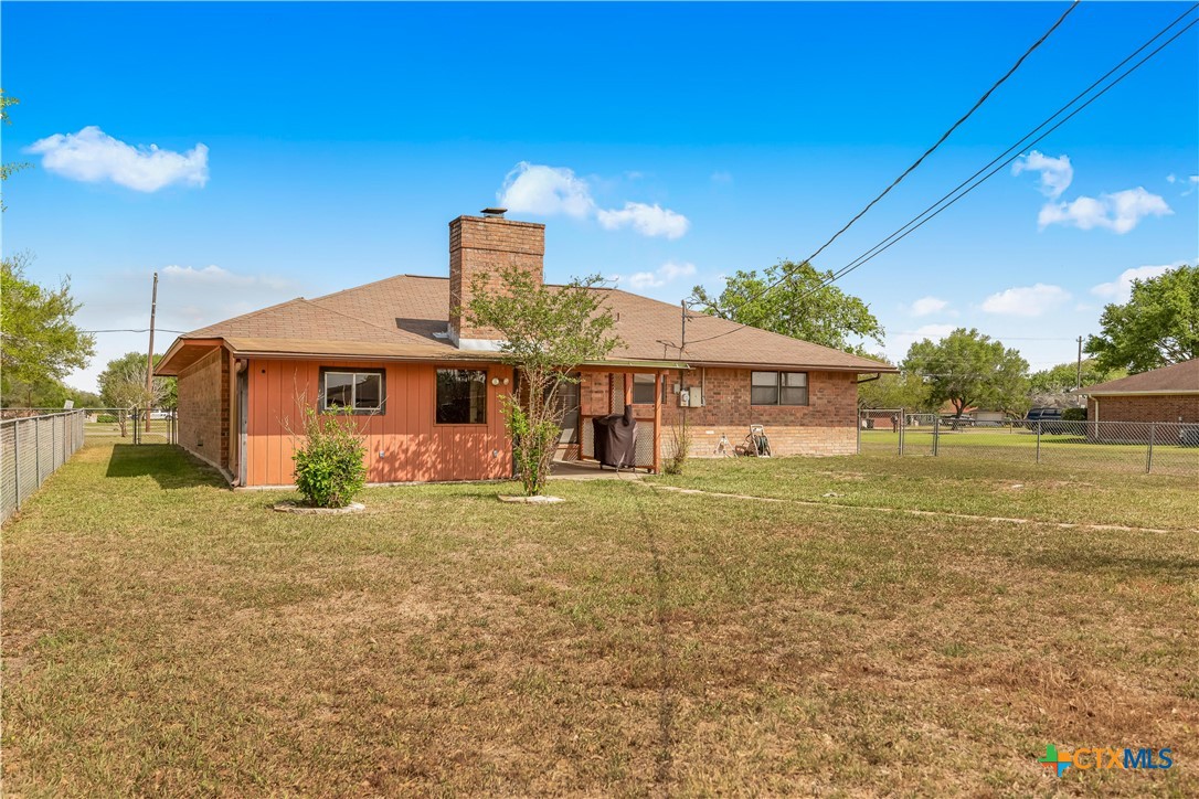 307 Pheasant Drive Victoria, TX 77905 - Photo 24 of 33 a front view of a house with a yard