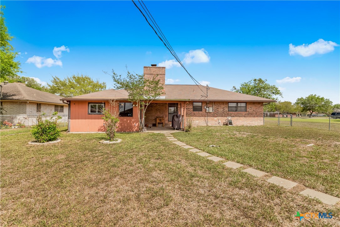 307 Pheasant Drive Victoria, TX 77905 - Photo 25 of 33 a front view of a house with a yard