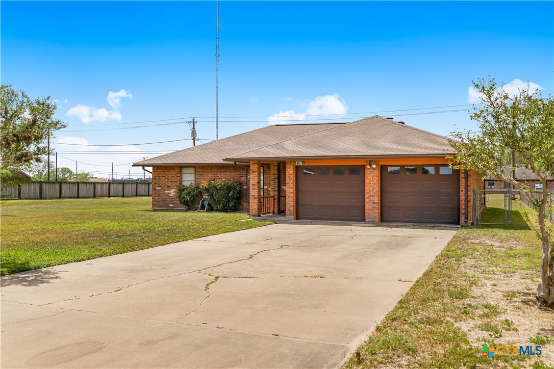 307 Pheasant Drive Victoria, TX 77905 - Photo 31 of 33 a front view of a house with a yard