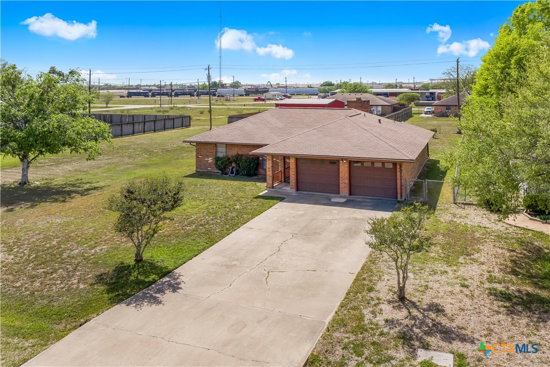 307 Pheasant Drive Victoria, TX 77905 - Photo 32 of 33 a front view of a house with a yard