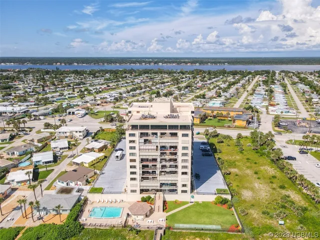 a view of building with yard