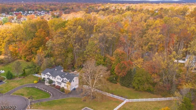 a view of swimming pool from a bathroom