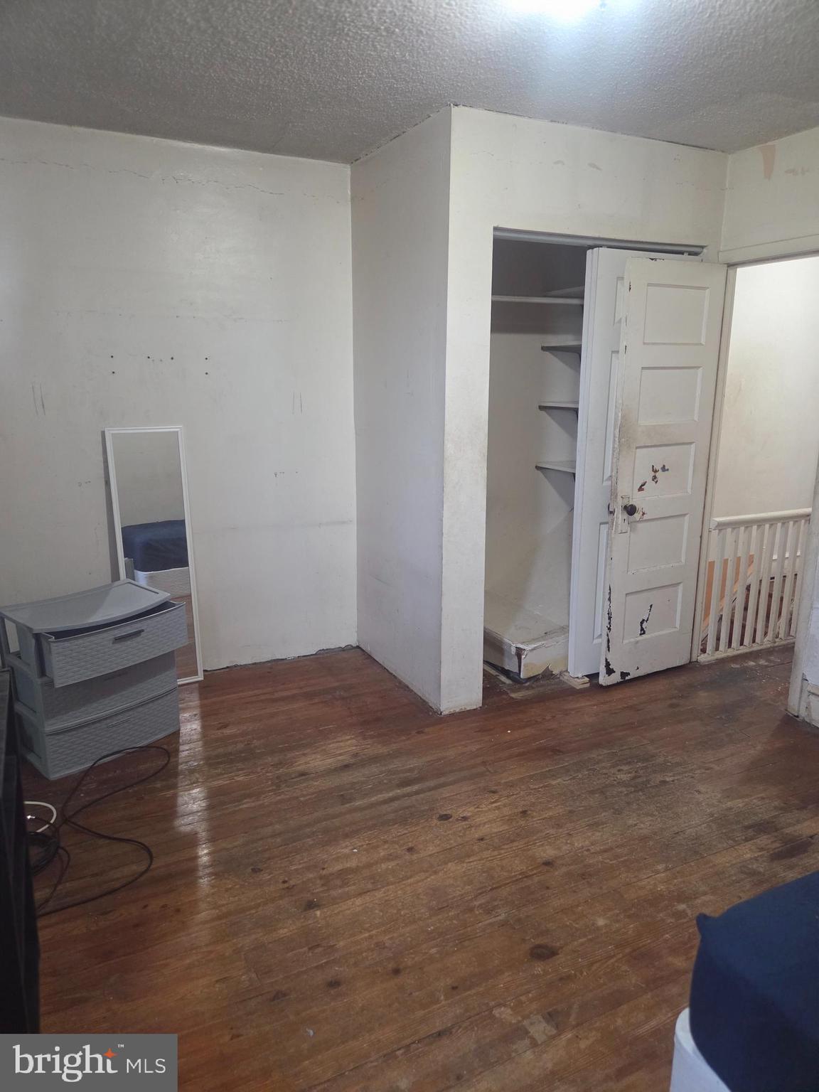 6378 Marsden Street Philadelphia, PA 19135 - Photo 14 of 24 a view of an empty room with wooden floor