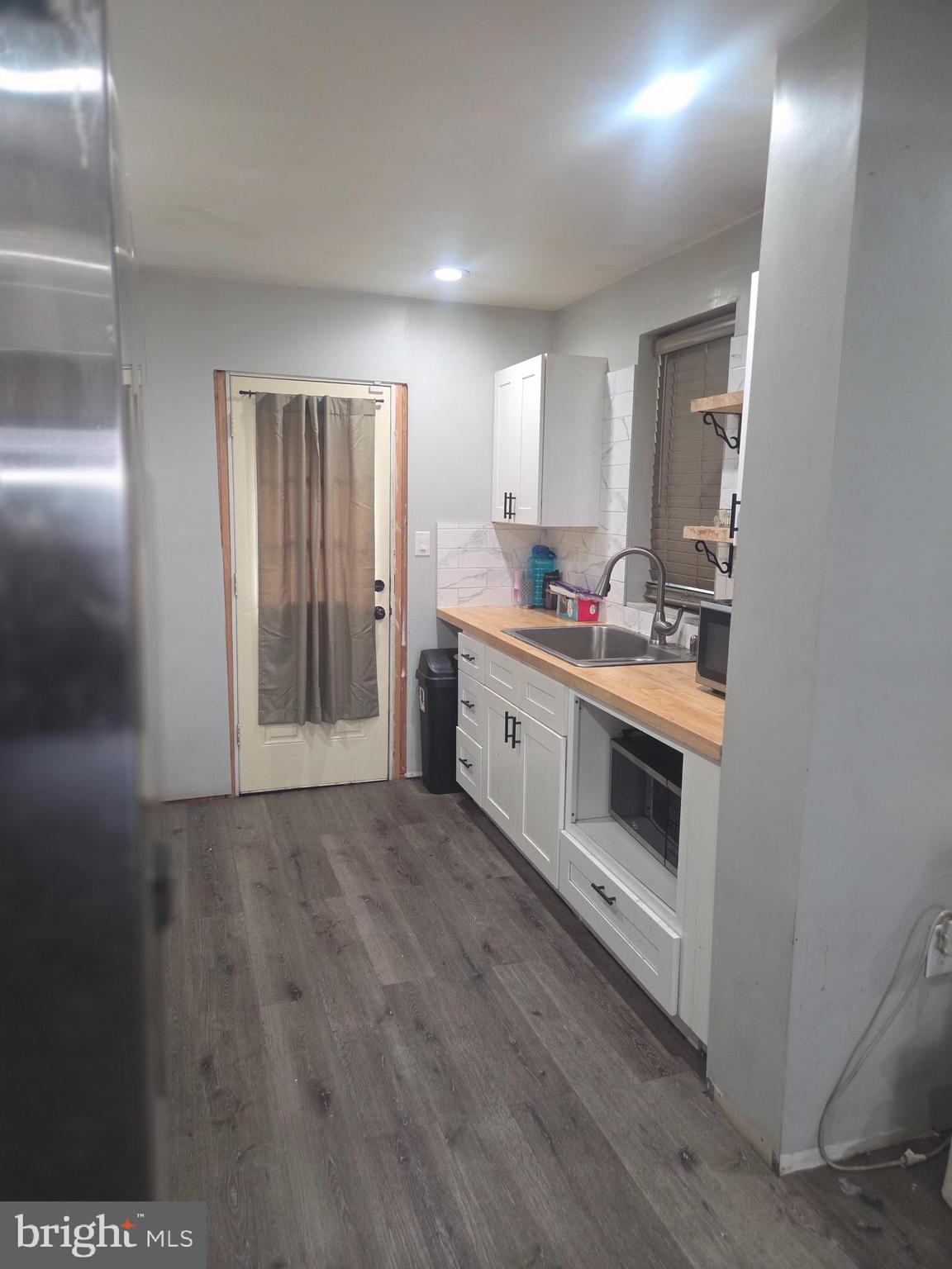 6378 Marsden Street Philadelphia, PA 19135 - Photo 18 of 24 a view of a kitchen with sink and dishwasher