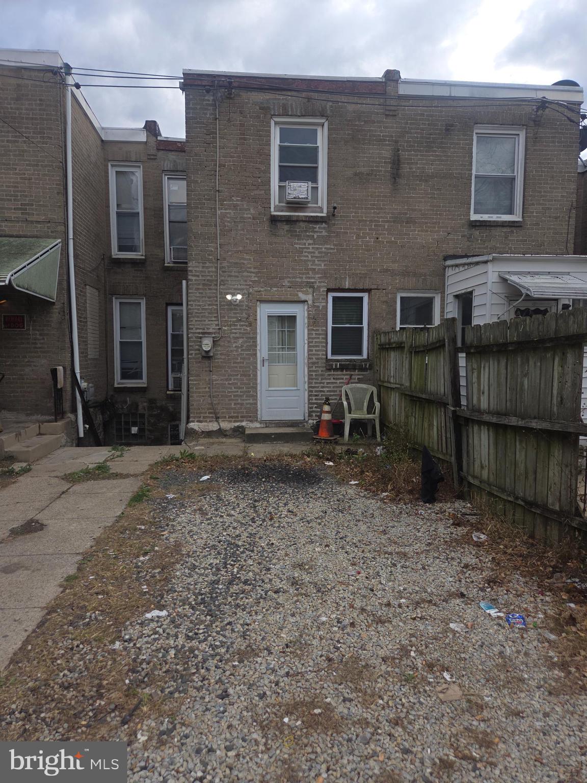 6378 Marsden Street Philadelphia, PA 19135 - Photo 2 of 24 a backyard of a house with barbeque oven