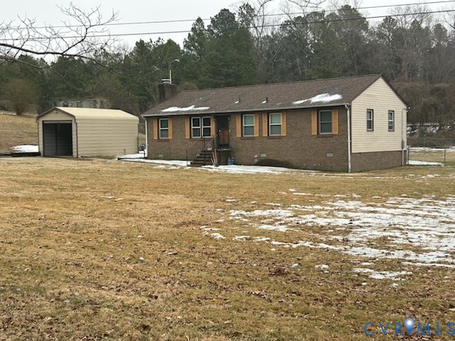 16111 Happy Hill Road Colonial Heights, VA 23834 - Photo 4 of 6 a view of a yard in front of a house with a large tree