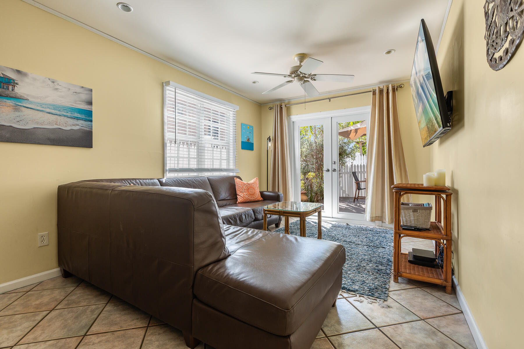 620 Thomas Street, Unit 175 Key West, FL 33040 - Photo 14 of 30 a living room with furniture and a flat screen tv