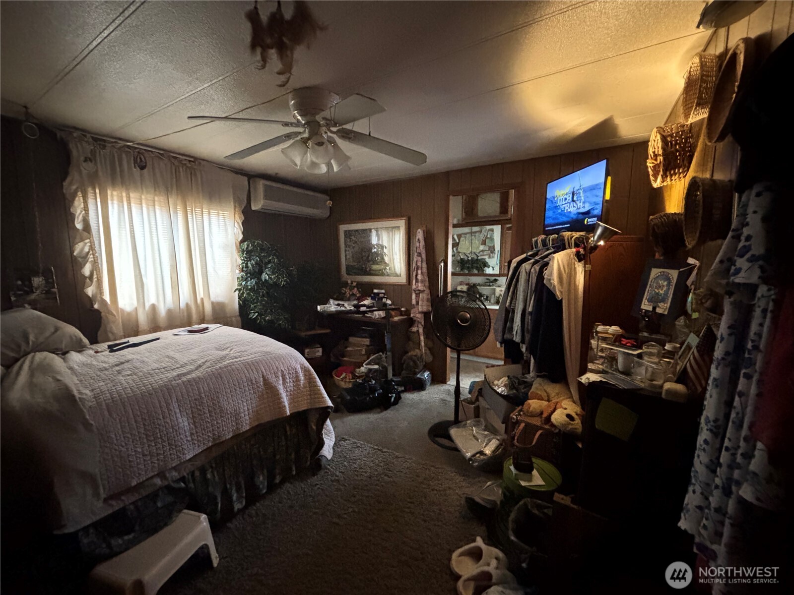 1841 Trosper Road Southwest, Unit 60 Tumwater, WA 98512 - Photo 12 of 18 a bed room with a bed and a ceiling fan