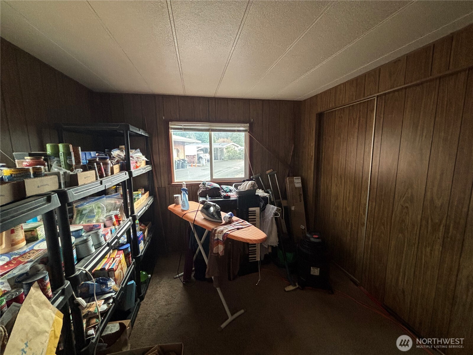 1841 Trosper Road Southwest, Unit 60 Tumwater, WA 98512 - Photo 14 of 18 a view of a livingroom with furniture and a window