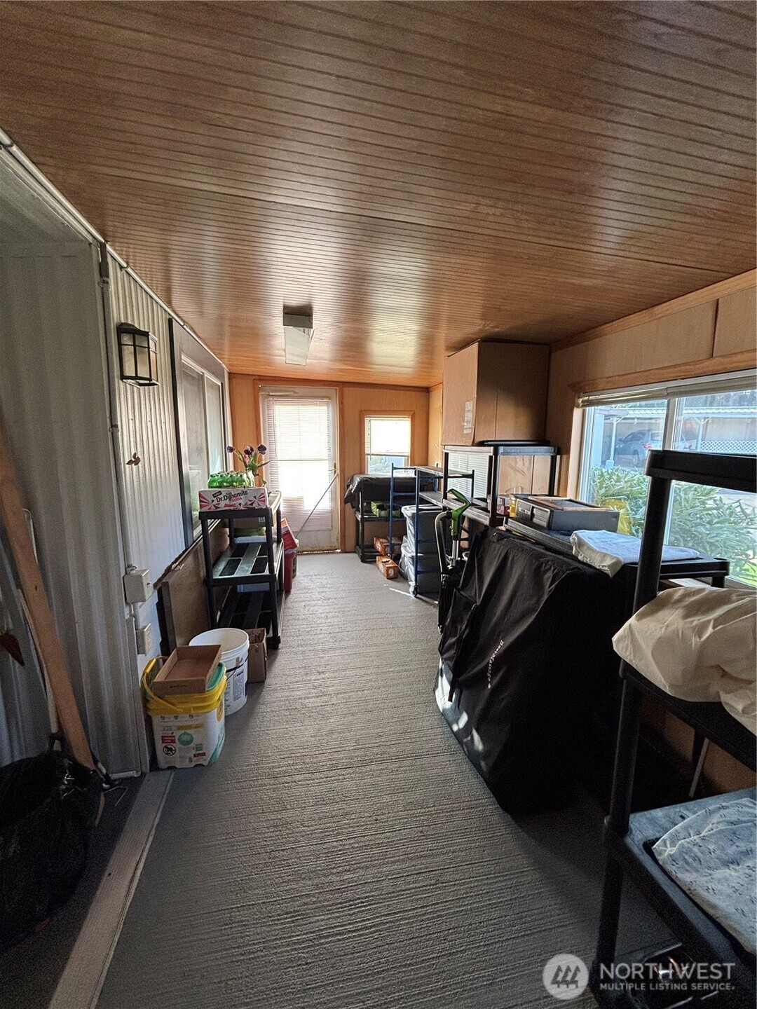 1841 Trosper Road Southwest, Unit 60 Tumwater, WA 98512 - Photo 7 of 18 a living room with furniture and a flat screen tv