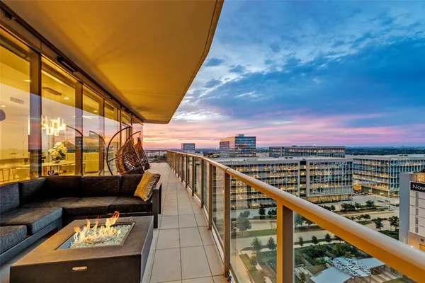 a view of balcony with furniture