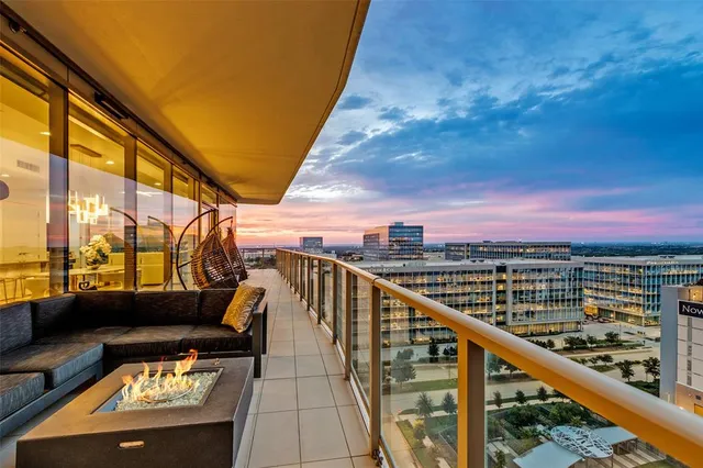 a view of balcony with furniture