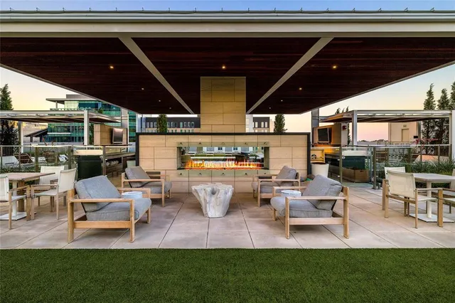 a patio with patio lots of furniture and outdoor seating