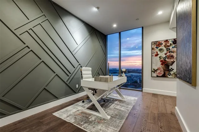 a work room with furniture and wooden floor