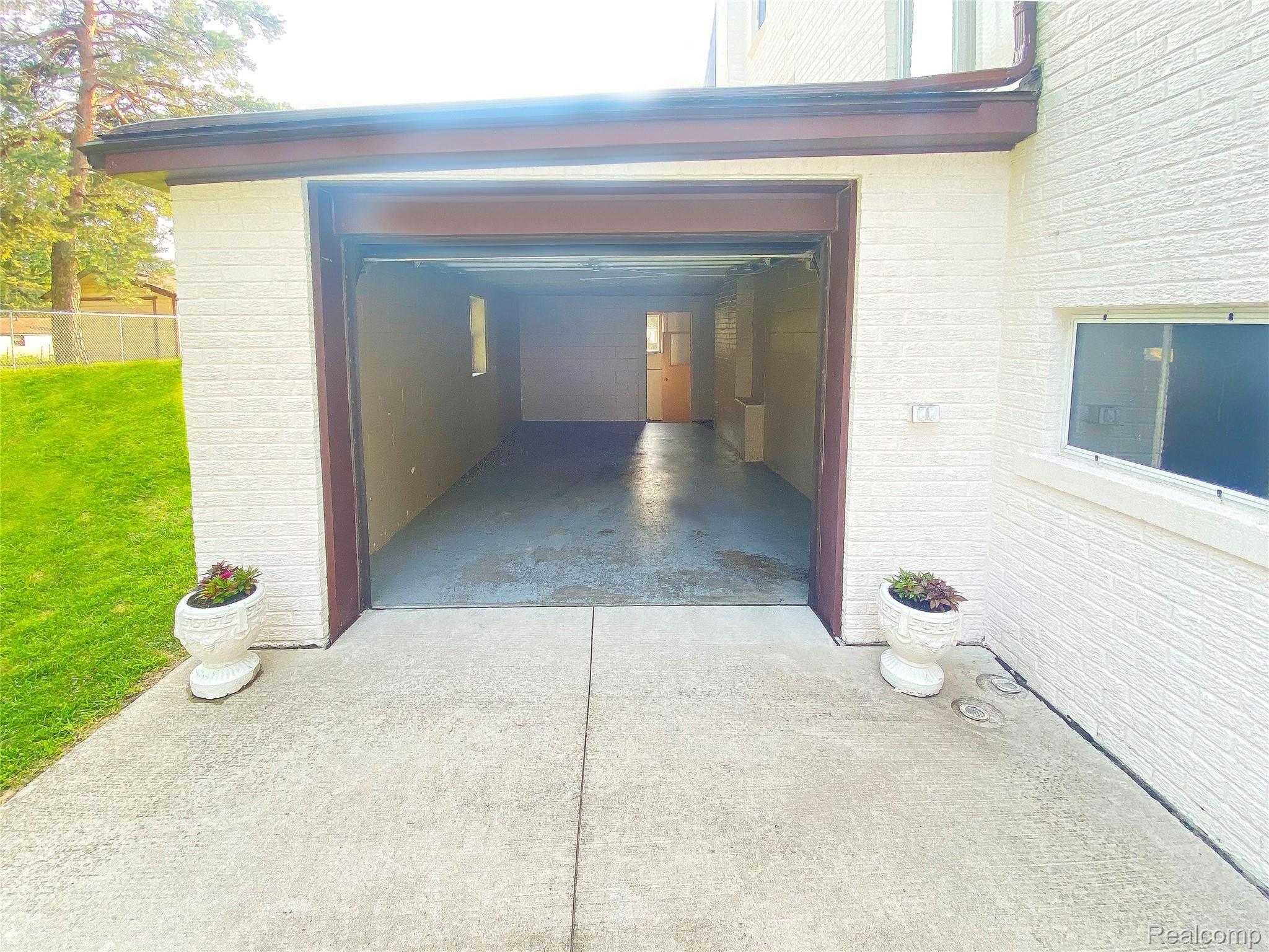 43341 Utica Road Sterling Heights, MI 48314 - Photo 14 of 18 Attached Garage Leads to Basement