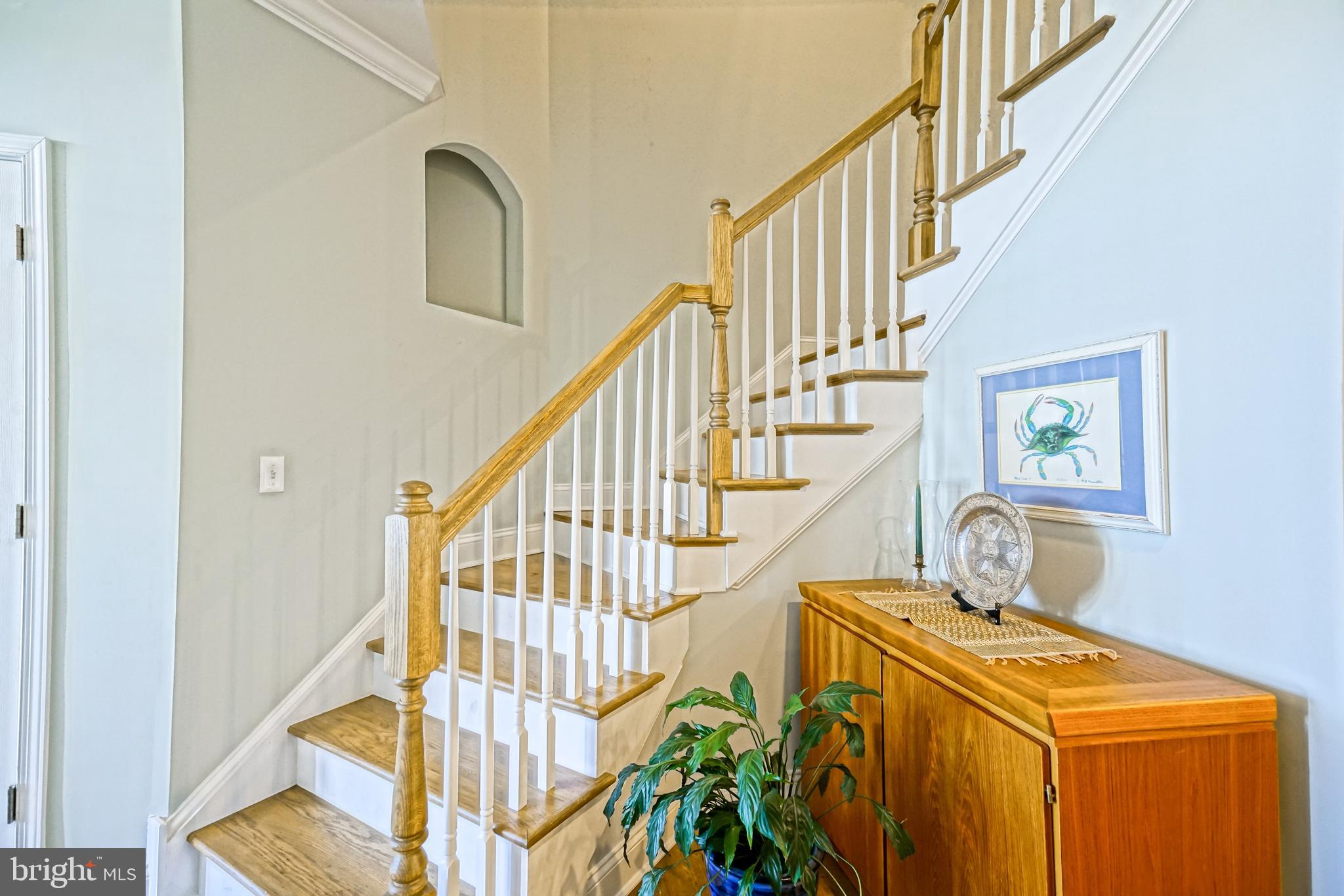 31301 Temple Road Lewes, DE 19958 - Photo 26 of 64 a view of entryway and hall with wooden floor
