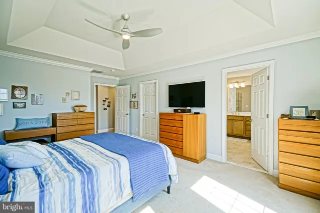 a spacious bathroom with a granite countertop sink mirror and a