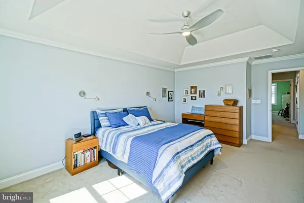 a bathroom with a shower and a sink