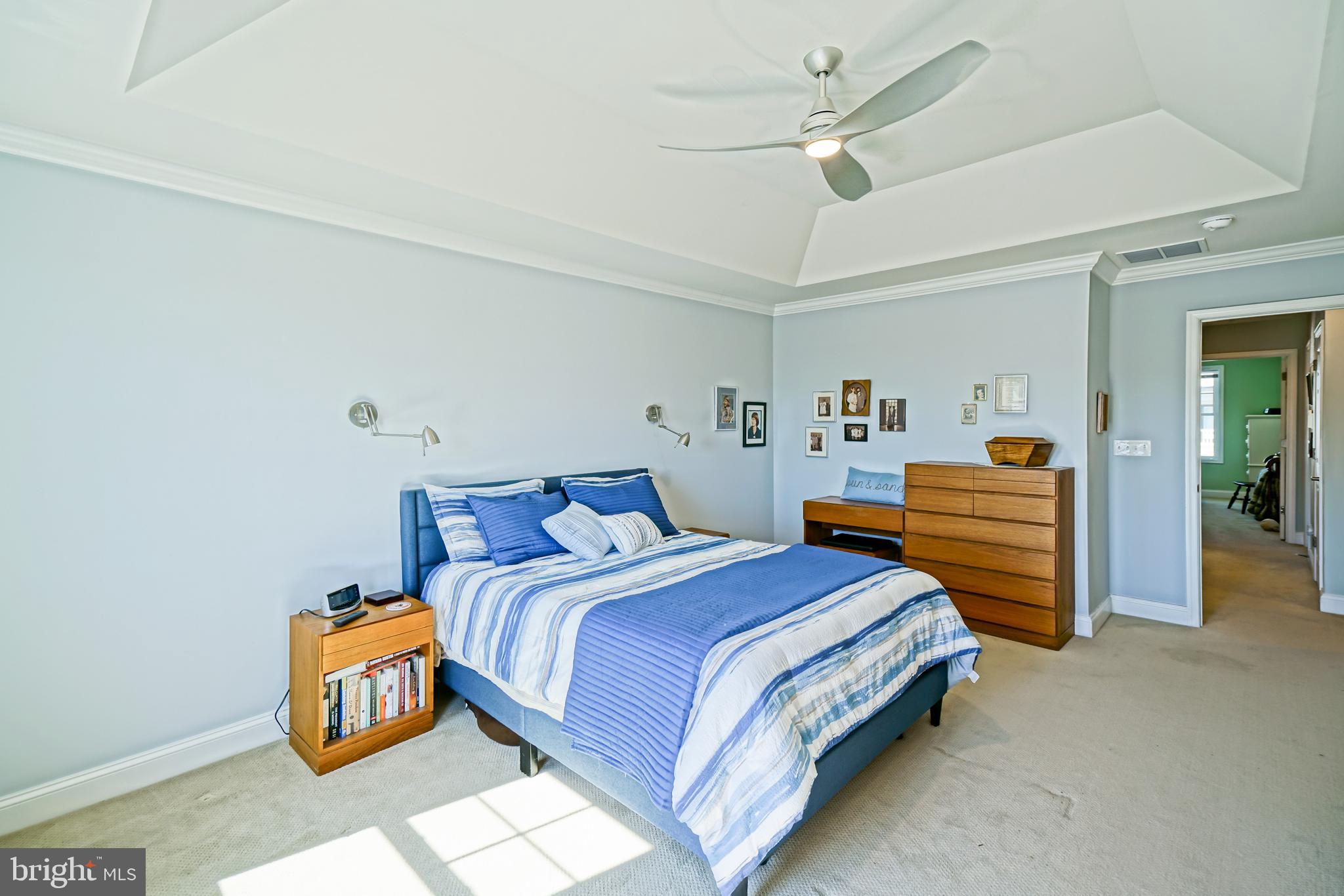 31301 Temple Road Lewes, DE 19958 - Photo 30 of 64 a bedroom with a bed and ceiling fan