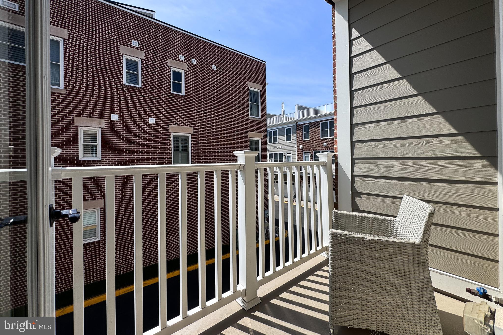 151 Center Street South, Unit 1 Vienna, VA 22180 - Photo 27 of 53 Natural gas line for grilling (behind this chair)