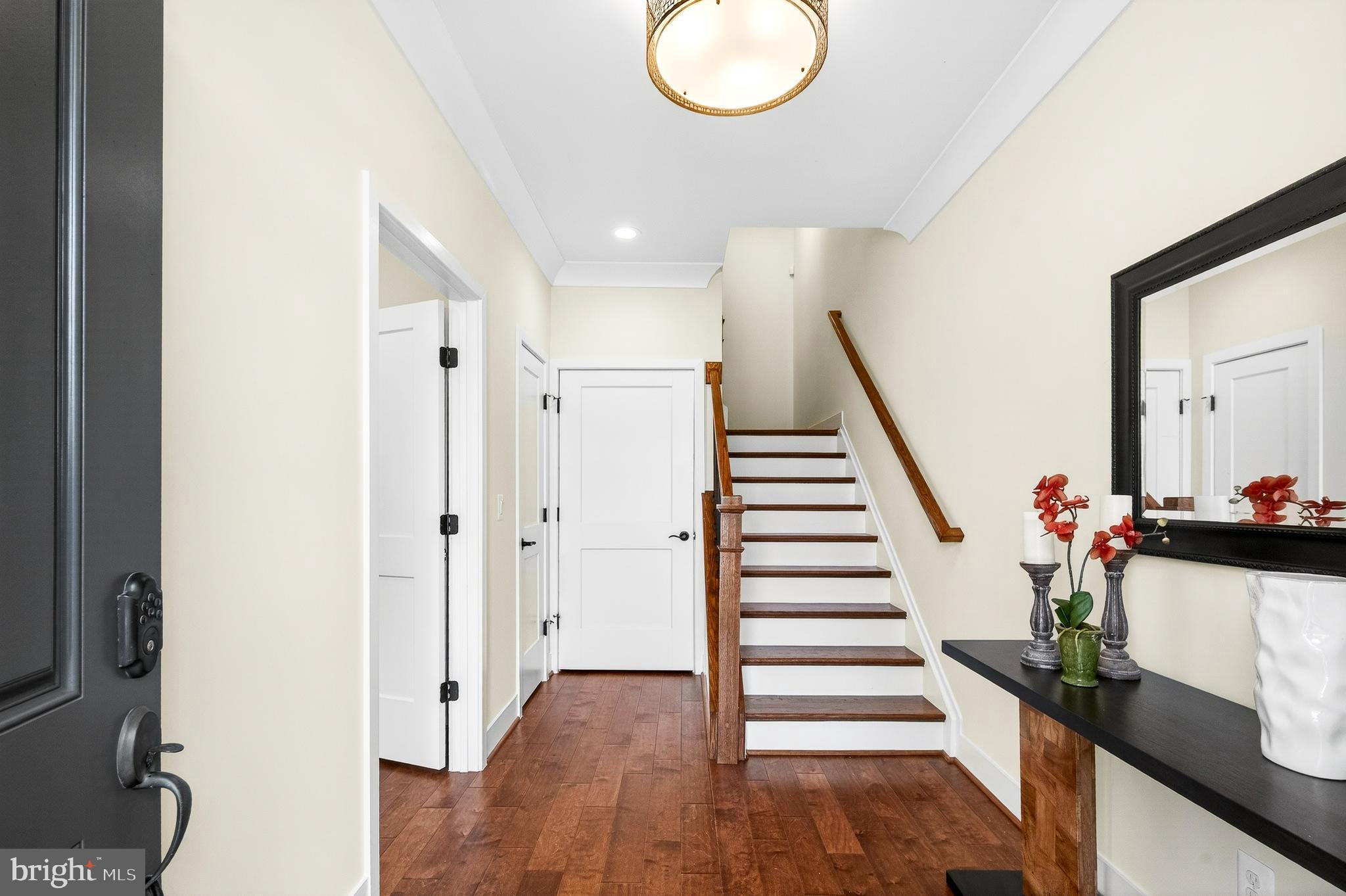 151 Center Street South, Unit 1 Vienna, VA 22180 - Photo 3 of 53 Upgraded engineered wood floors, oak stair cases