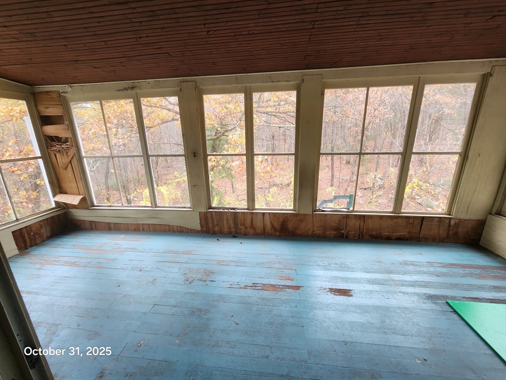 7 Pine Hill Road Grafton, MA 01560 - Photo 7 of 18 an empty room with large windows
