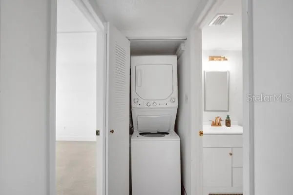 a room that has a window in it and a bathroom