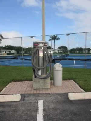 a view of an outdoor space and tennis court