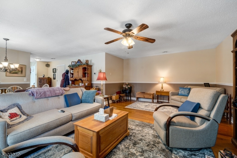 8 Lee Court Lebanon, NJ 08833 - Photo 4 of 20 a living room with furniture and a ceiling fan