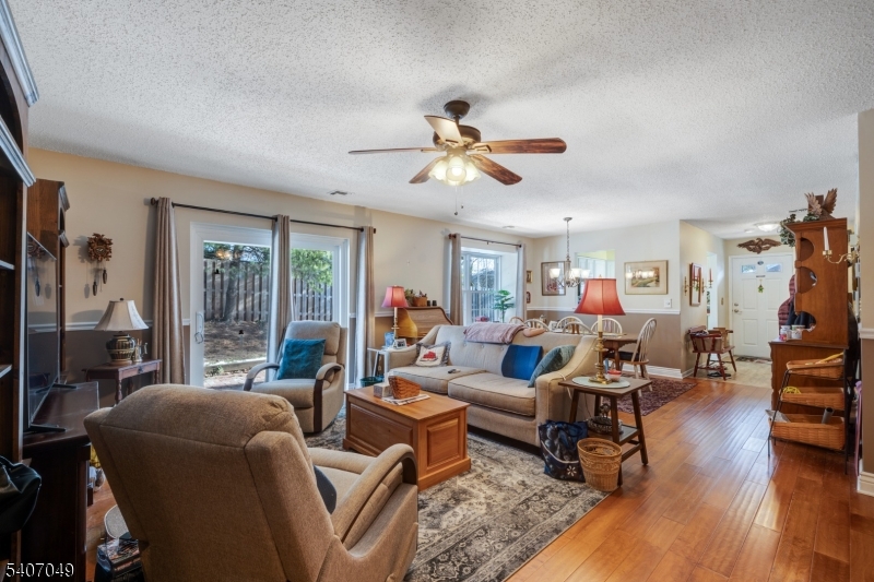 8 Lee Court Lebanon, NJ 08833 - Photo 6 of 20 a living room with furniture ceiling fan and a window