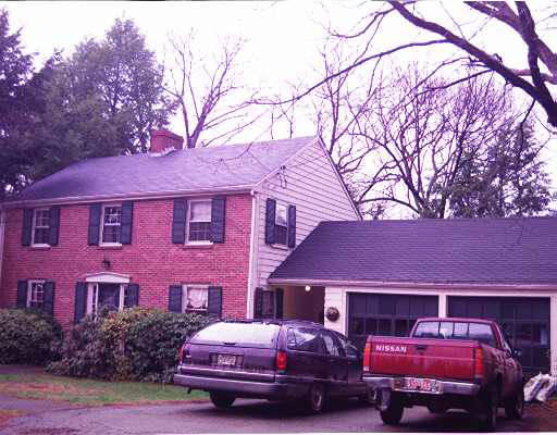 149 Paul Revere Road Needham, MA 02494 - Photo 1 of 1 a front view of a house with yard