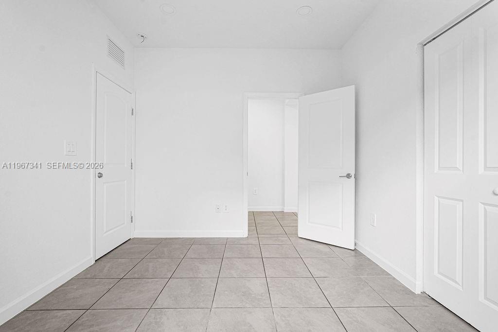 12735 Southwest 211th Street Miami, FL 33177 - Photo 11 of 34 a view of an empty room