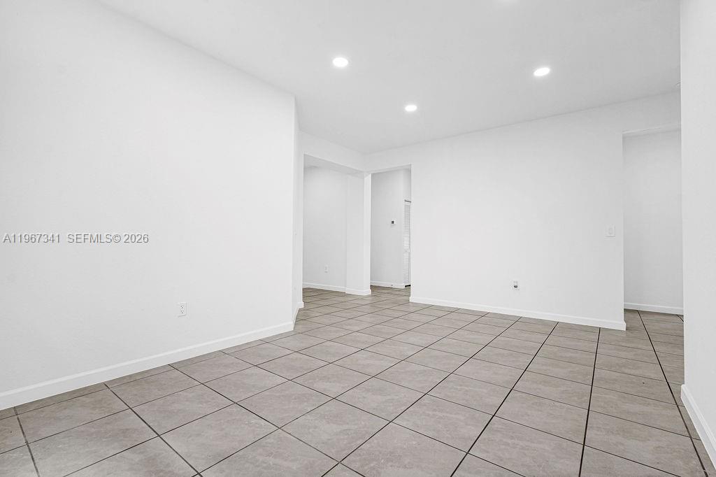 12735 Southwest 211th Street Miami, FL 33177 - Photo 17 of 34 a view of an empty room