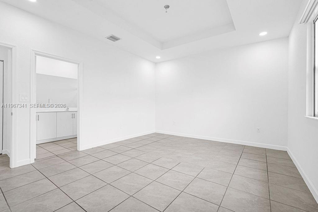 12735 Southwest 211th Street Miami, FL 33177 - Photo 23 of 34 a view of an empty room
