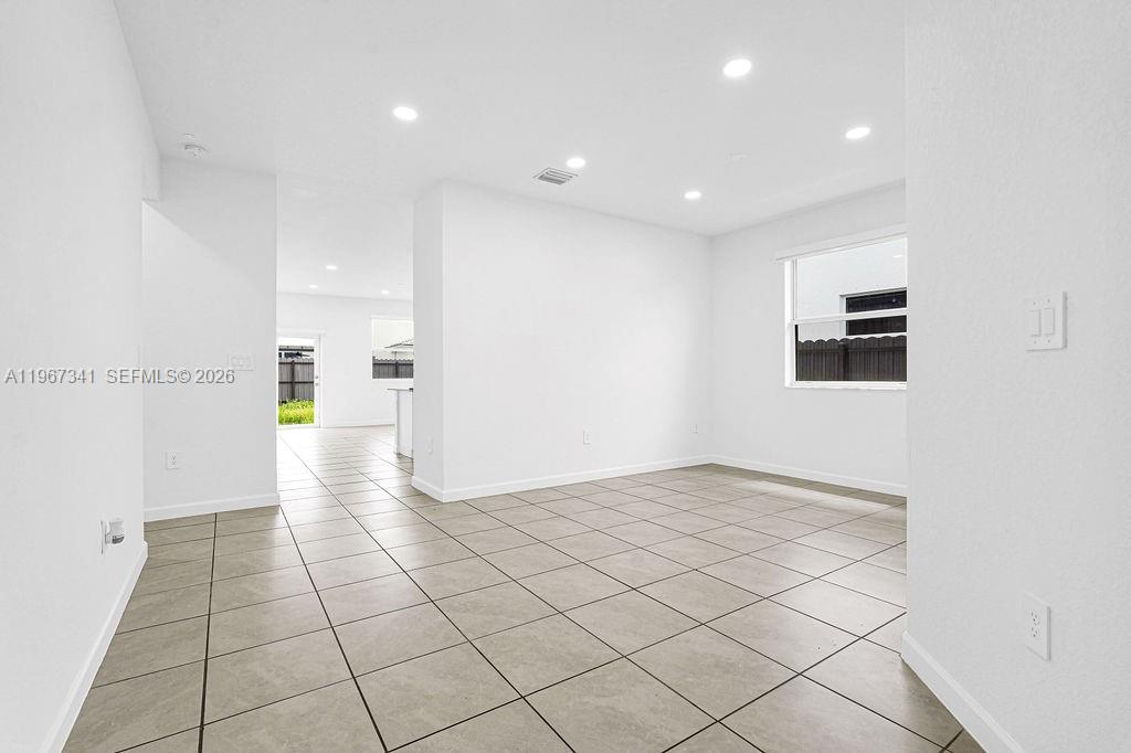 12735 Southwest 211th Street Miami, FL 33177 - Photo 5 of 34 a view of an empty room