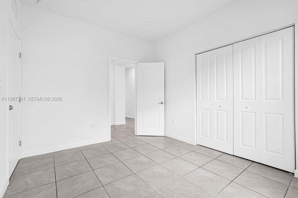 12735 Southwest 211th Street Miami, FL 33177 - Photo 10 of 34 a view of an empty room