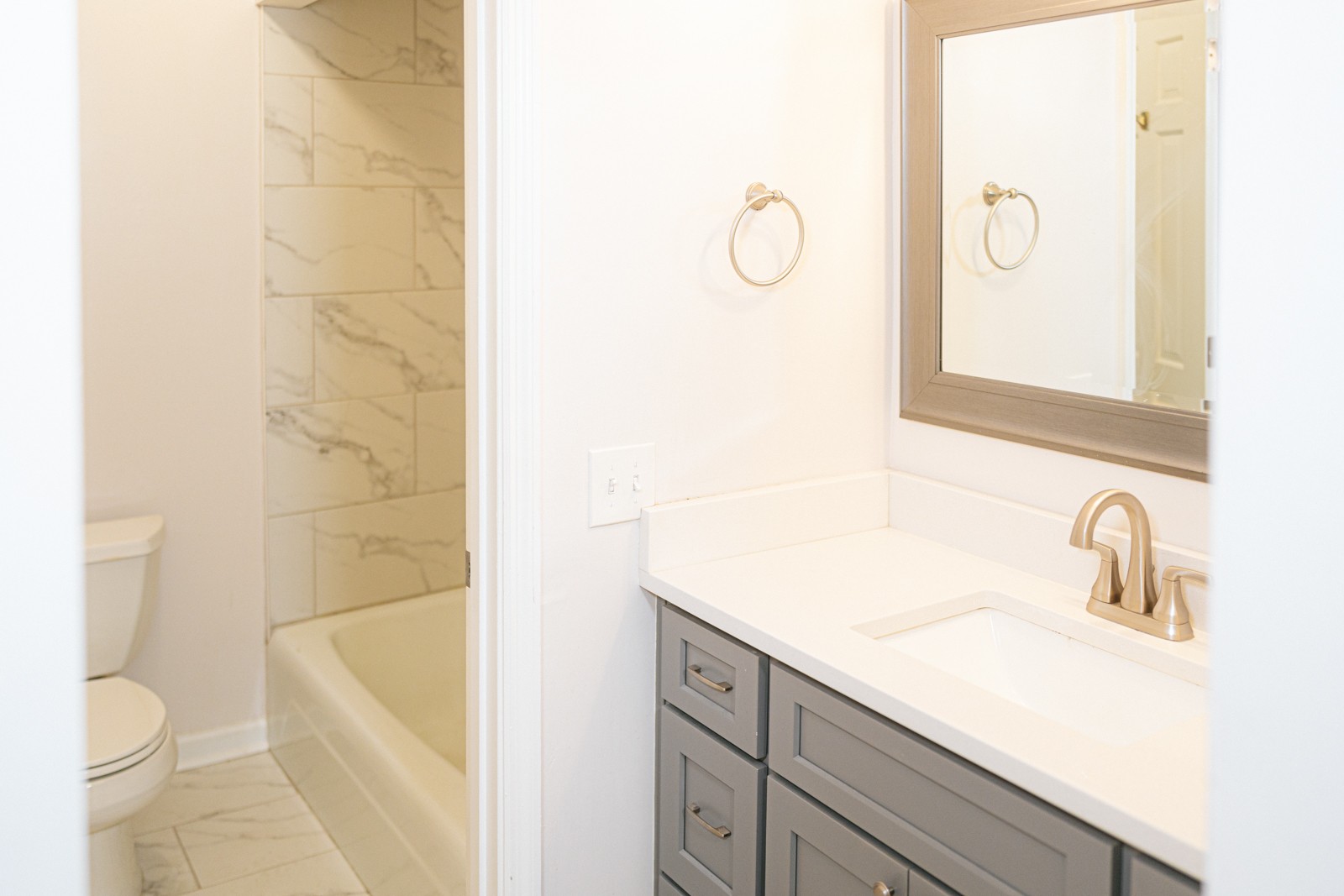 601 Boyd Mill Avenue, Unit G2 Franklin, TN 37064 - Photo 12 of 30 a bathroom with a sink a toilet and shower
