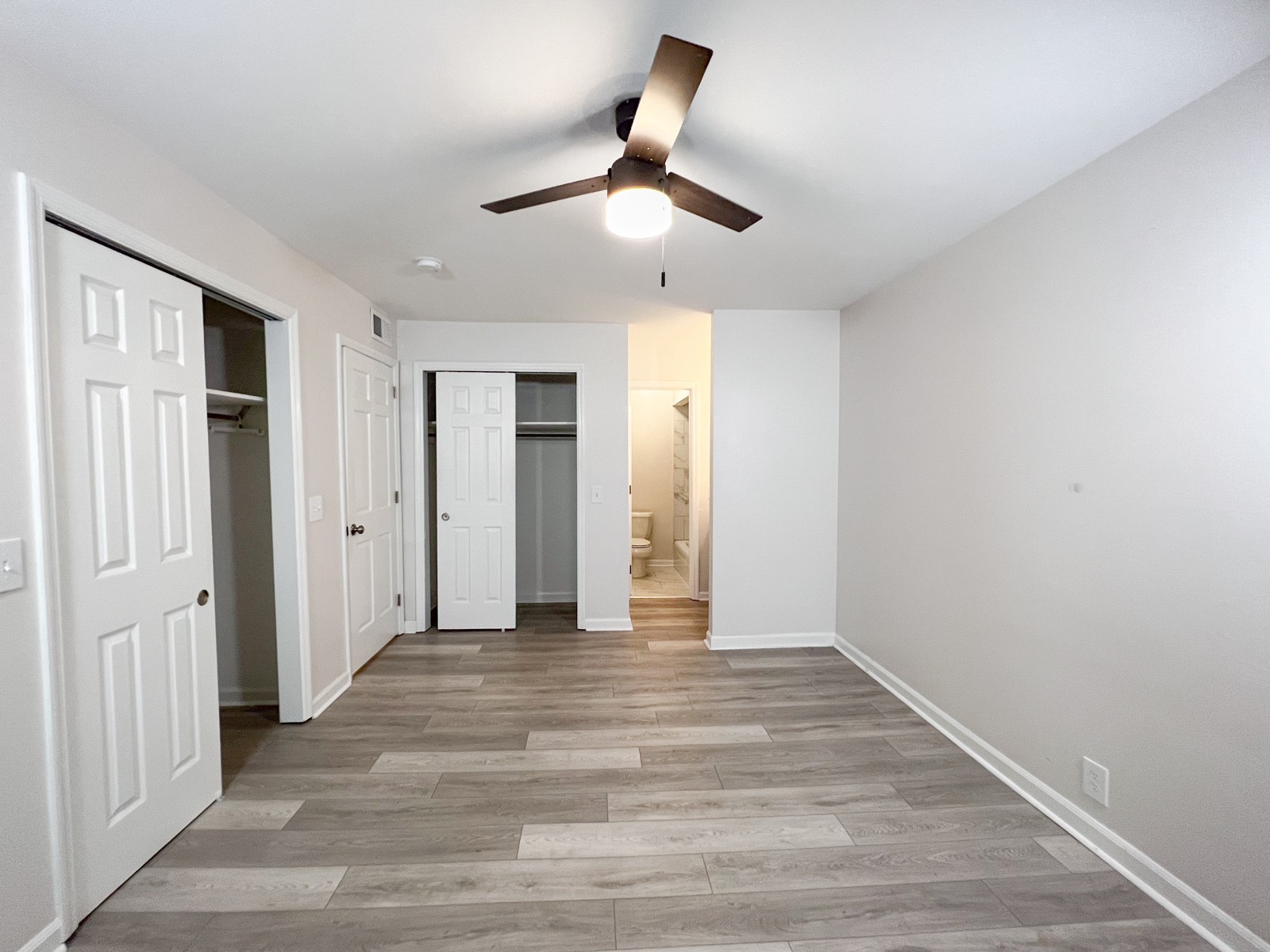601 Boyd Mill Avenue, Unit G2 Franklin, TN 37064 - Photo 16 of 30 a view of empty room with wooden floor