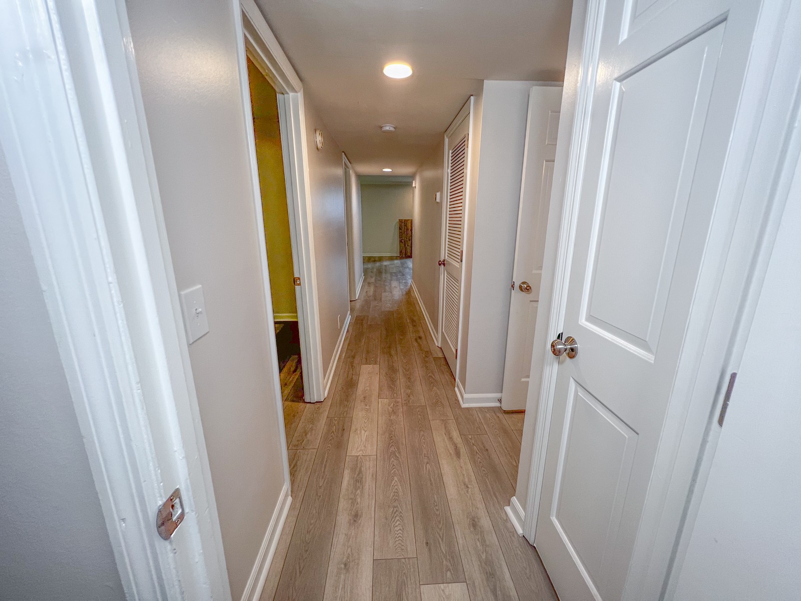 601 Boyd Mill Avenue, Unit G2 Franklin, TN 37064 - Photo 21 of 30 a view of a hallway with wooden floor and staircase