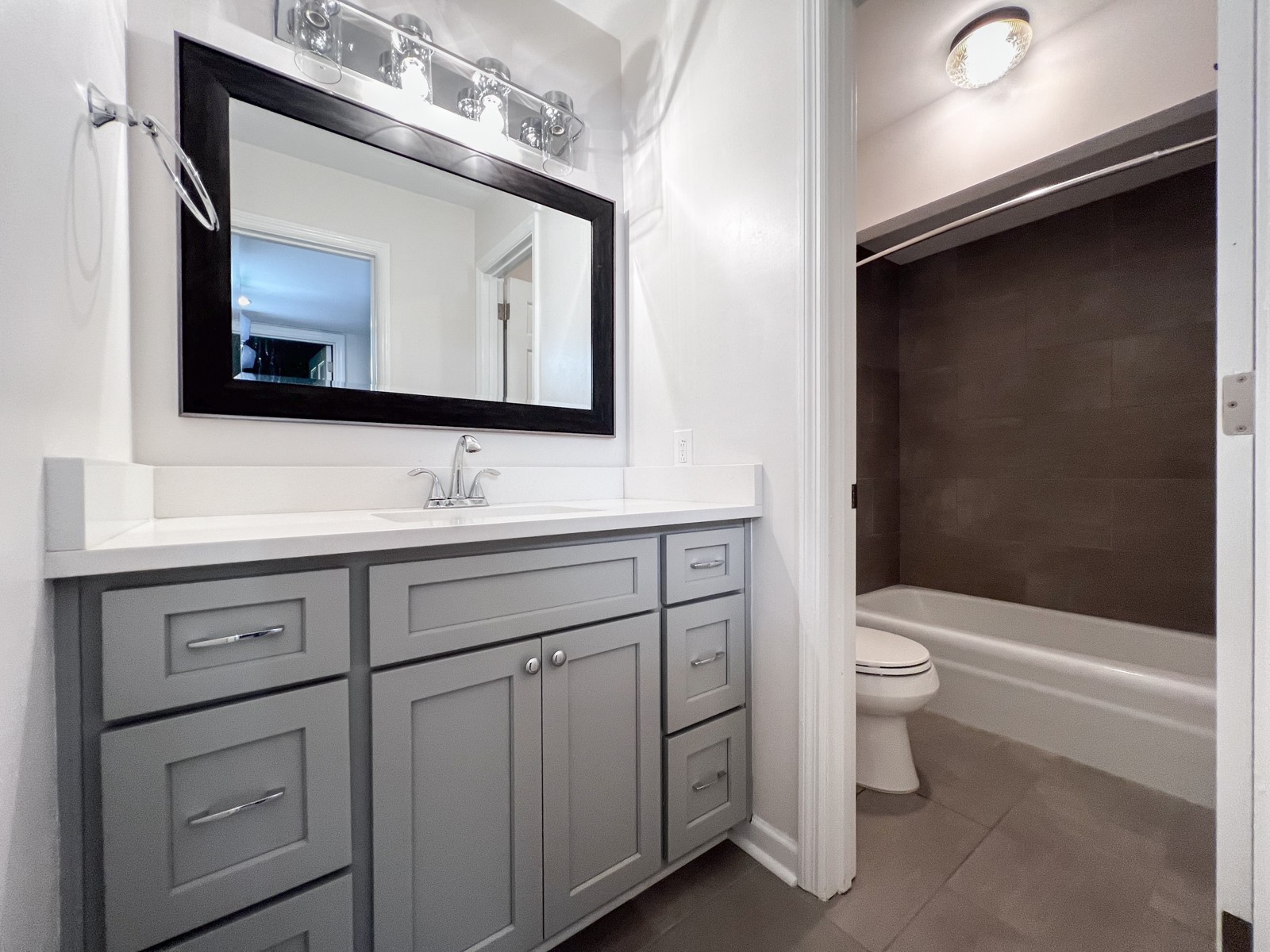 601 Boyd Mill Avenue, Unit G2 Franklin, TN 37064 - Photo 22 of 30 a bathroom with a toilet sink and mirror