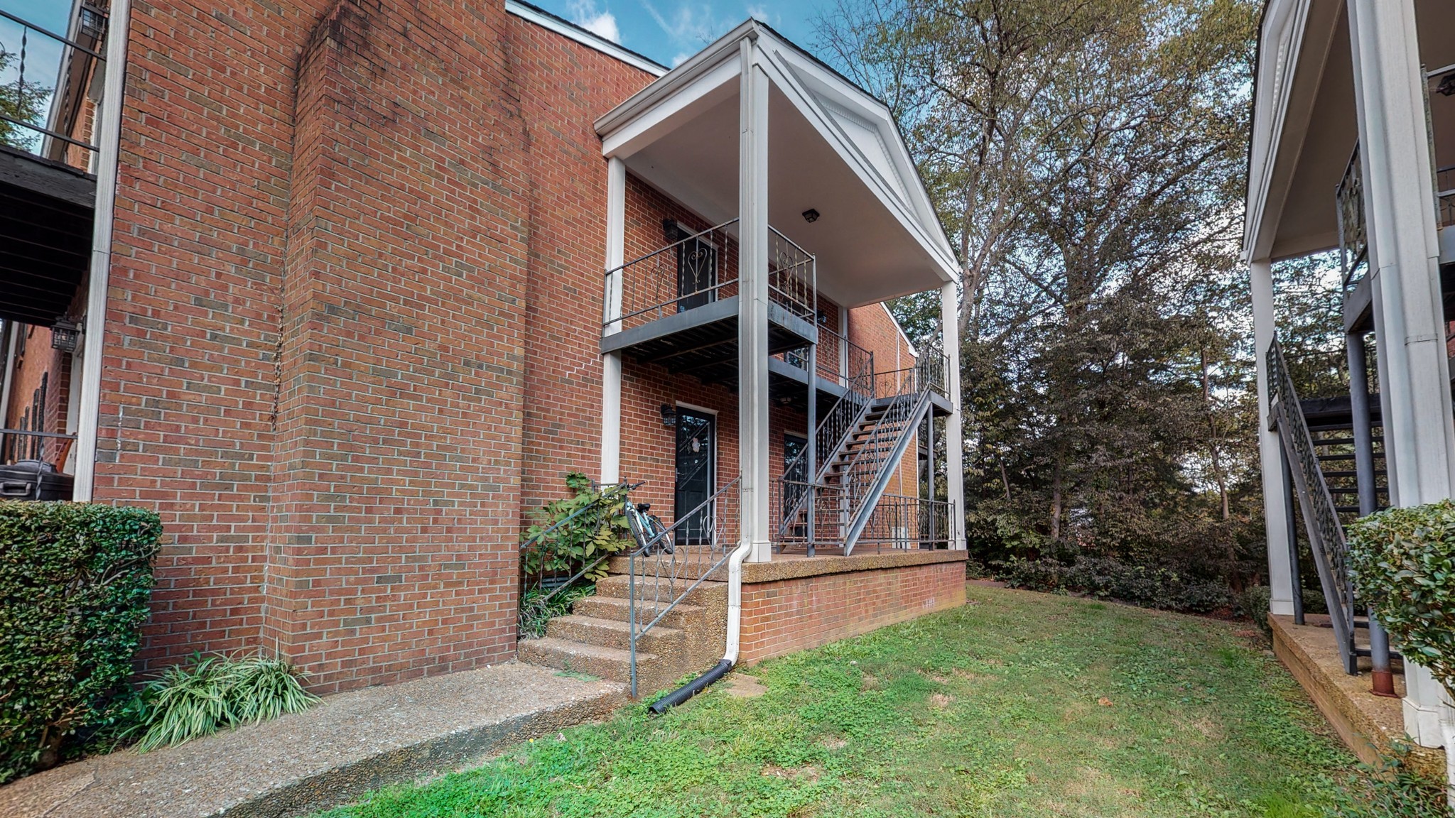 601 Boyd Mill Avenue, Unit G2 Franklin, TN 37064 - Photo 24 of 30 a front view of a house with garden