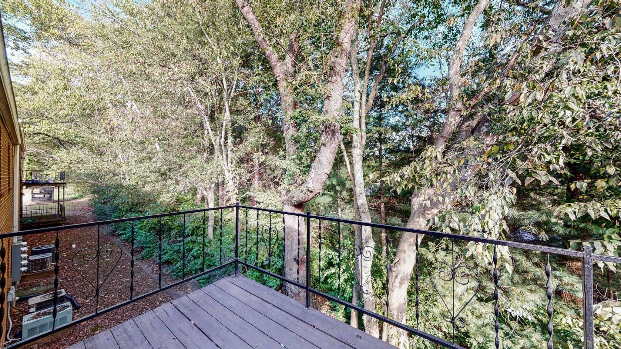 601 Boyd Mill Avenue, Unit G2 Franklin, TN 37064 - Photo 28 of 30 a view of balcony with wooden floor and fence