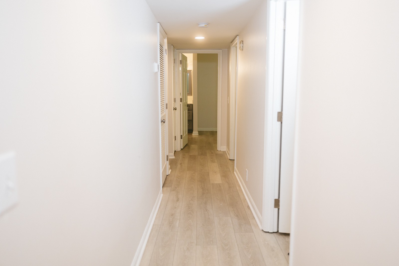 601 Boyd Mill Avenue, Unit G2 Franklin, TN 37064 - Photo 5 of 30 a view of a hallway with wooden floor
