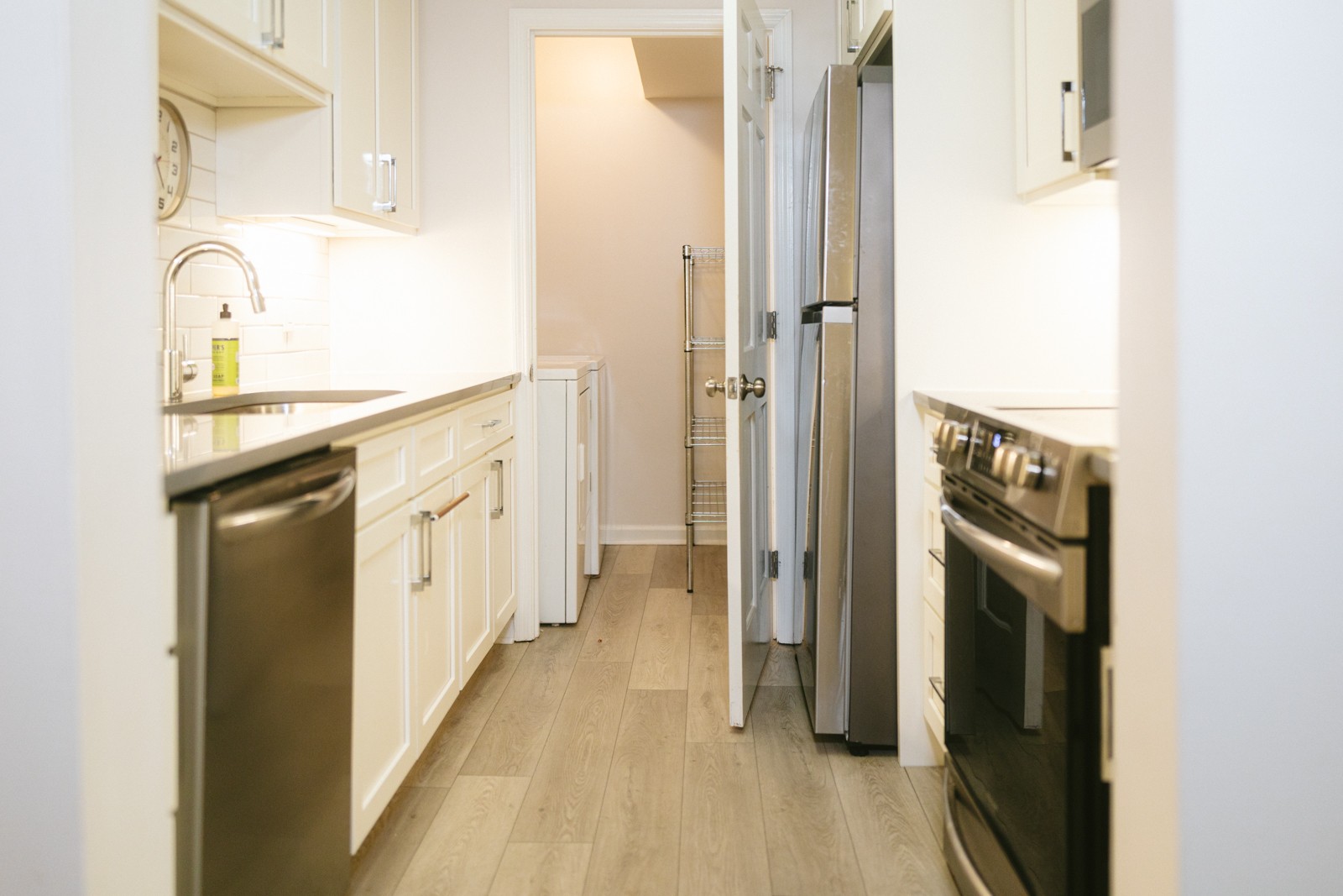 601 Boyd Mill Avenue, Unit G2 Franklin, TN 37064 - Photo 7 of 30 a kitchen with a refrigerator and a sink