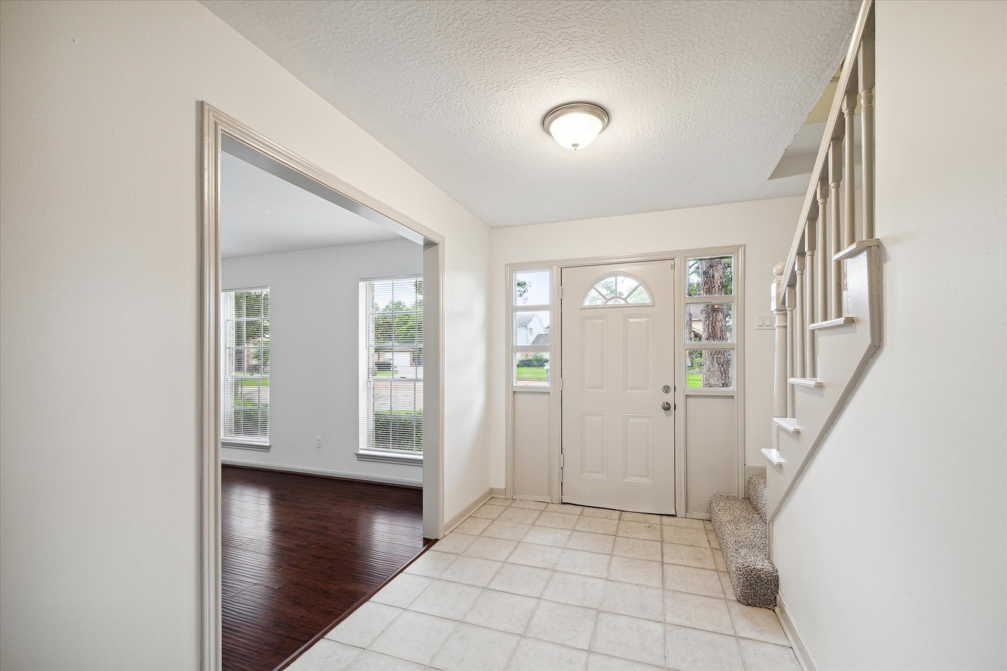 10407 Rippling Fields Drive Houston, TX 77064 - Photo 2 of 17 View of front entry door with tile floors.