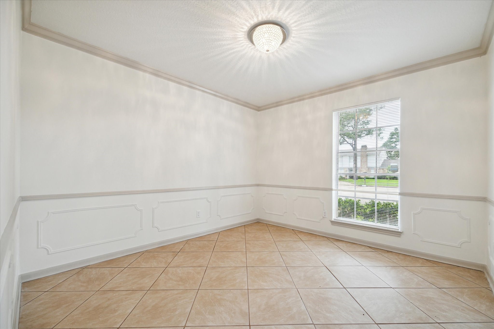 10407 Rippling Fields Drive Houston, TX 77064 - Photo 4 of 17 Another view of formal dining room with tile floors.