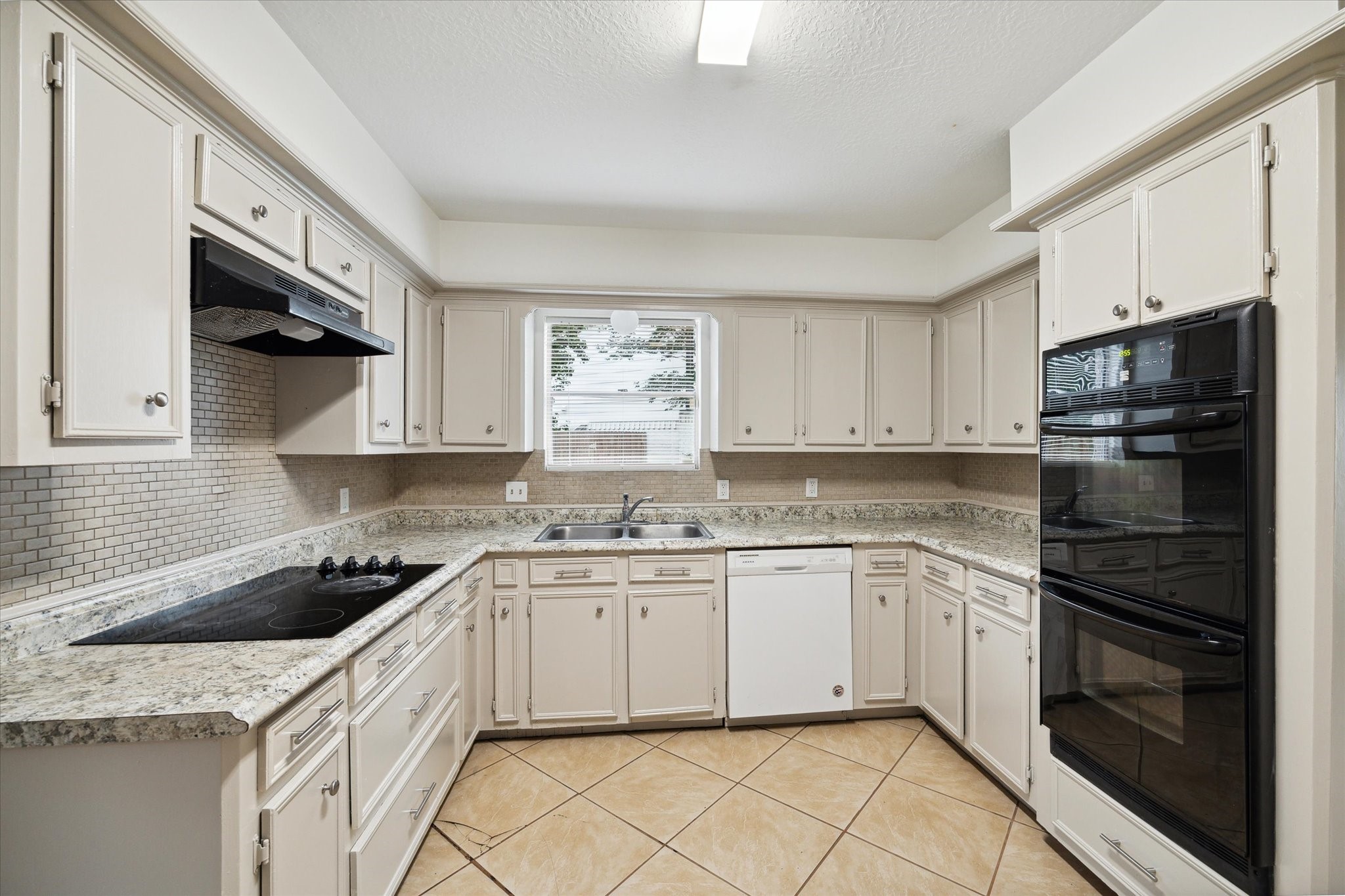 10407 Rippling Fields Drive Houston, TX 77064 - Photo 6 of 17 Another view of kitchen with double ovens.