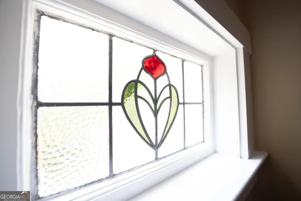 a view of a door and a window