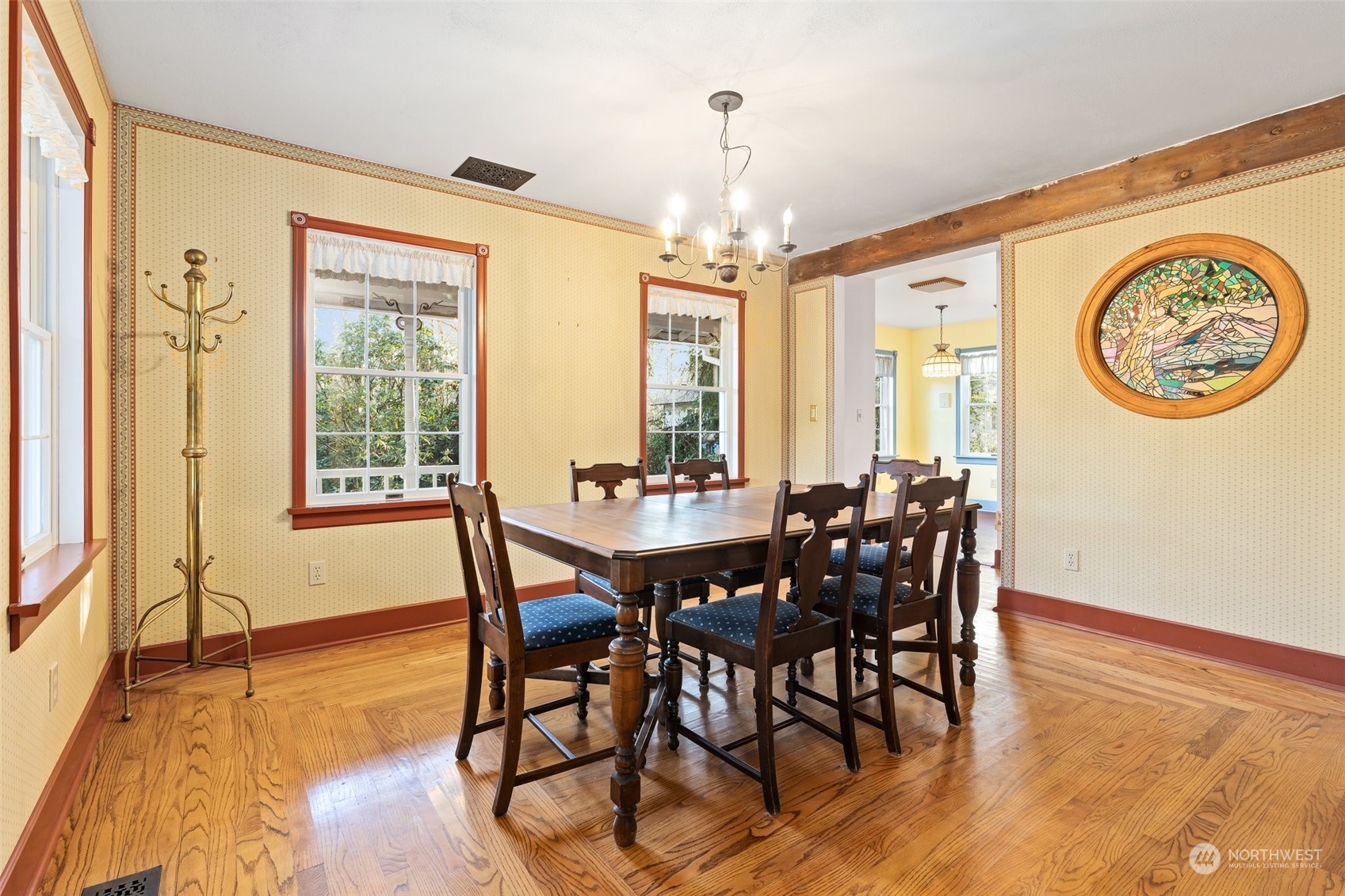 8120 Libby Road Northeast Olympia, WA 98506 - Photo 11 of 36 a view of a dining room with furniture window and wooden floor